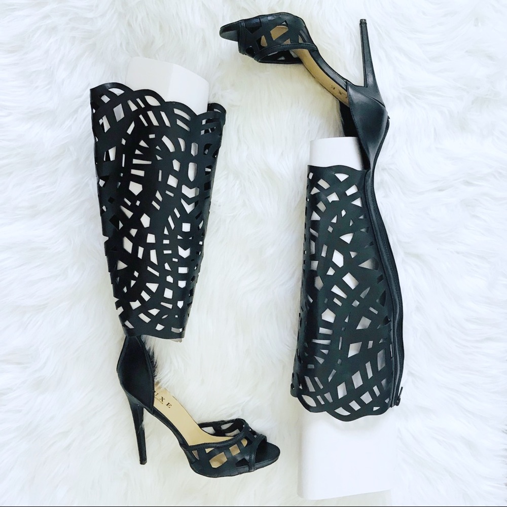 Just Fab gladiator heels black size 10.